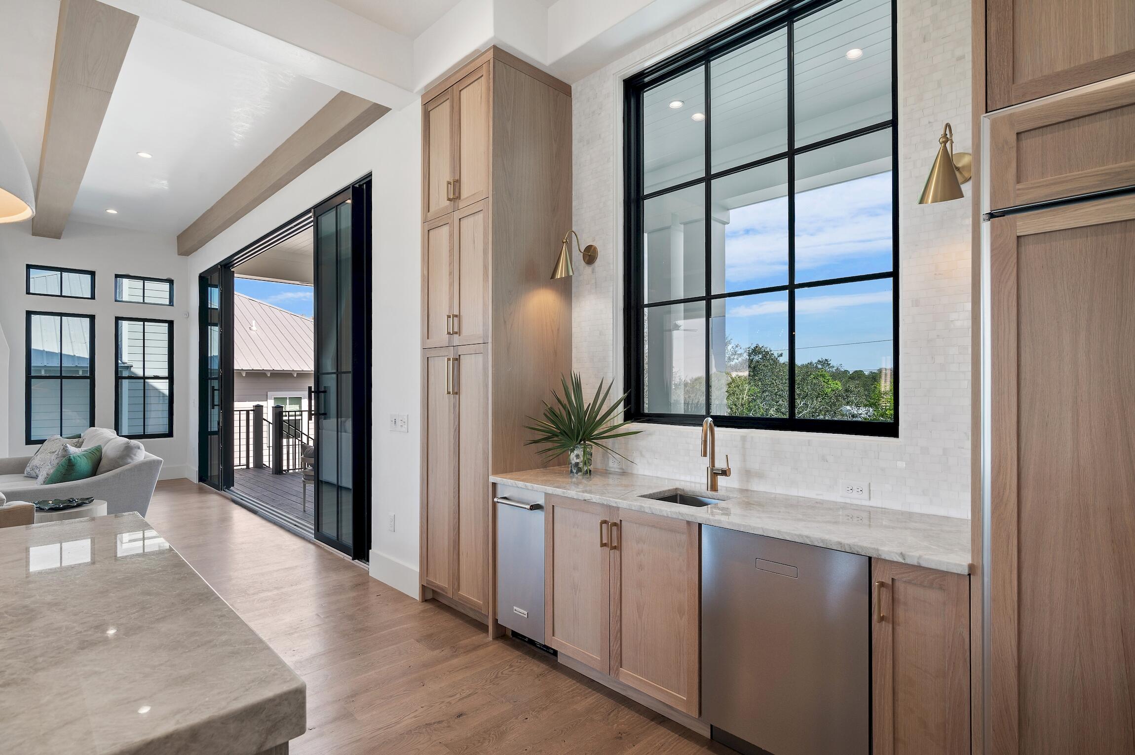 102 Bullard Road Santa Rosa Beach, FL 32459 - Photo 28 of 63 a bathroom with a double vanity sink and a large mirror