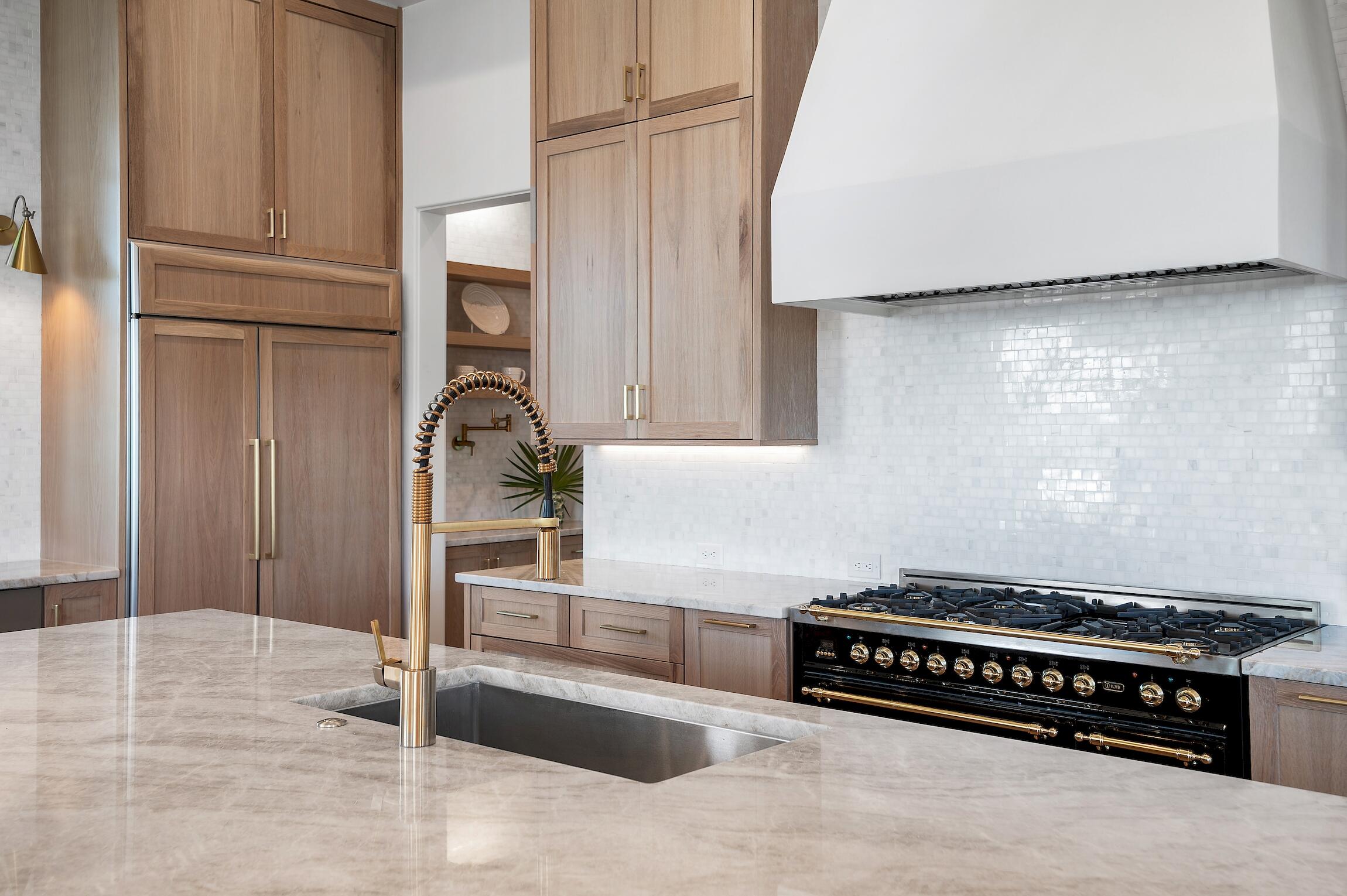 102 Bullard Road Santa Rosa Beach, FL 32459 - Photo 29 of 63 a kitchen with granite countertop a stove and a refrigerator