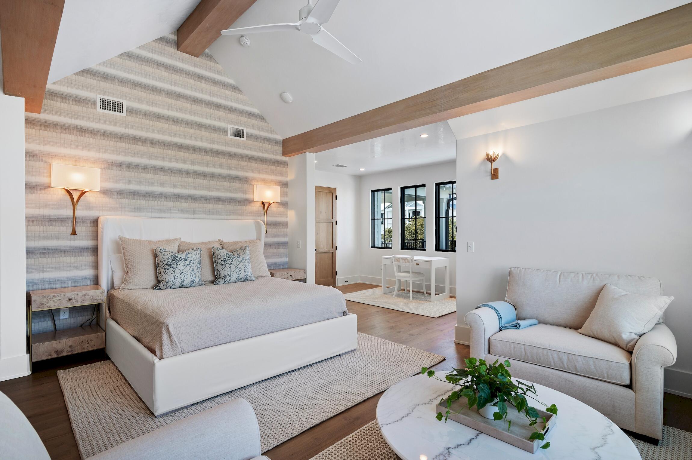 102 Bullard Road Santa Rosa Beach, FL 32459 - Photo 36 of 63 a bedroom with a large bed mirror and a couch