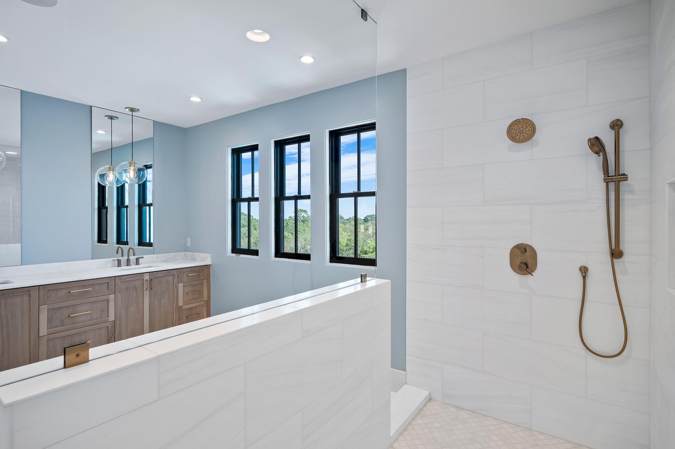 102 Bullard Road Santa Rosa Beach, FL 32459 - Photo 39 of 63 a spacious bathroom with a double vanity sink and shower