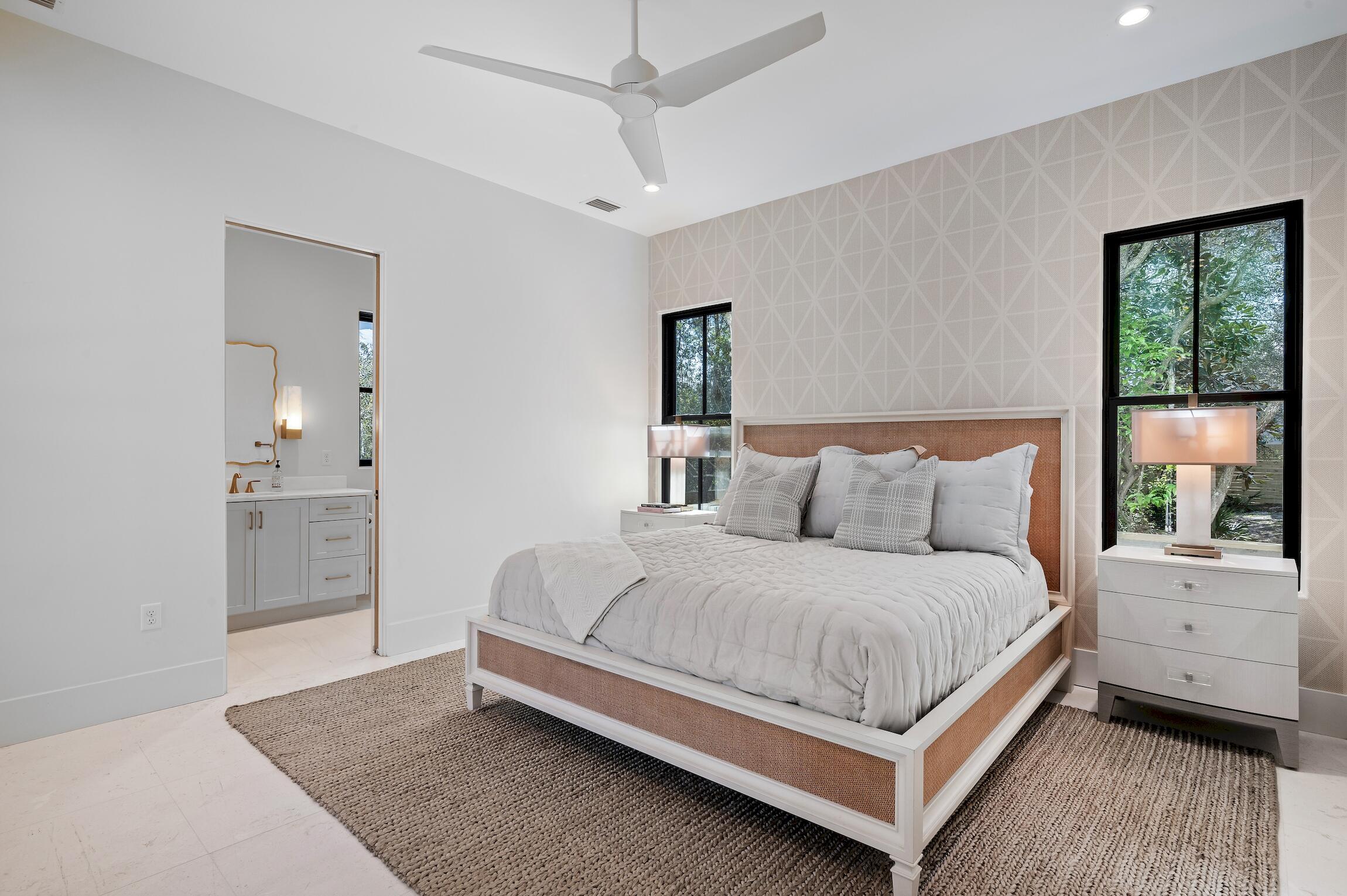 102 Bullard Road Santa Rosa Beach, FL 32459 - Photo 46 of 63 a bedroom with a large bed and a window