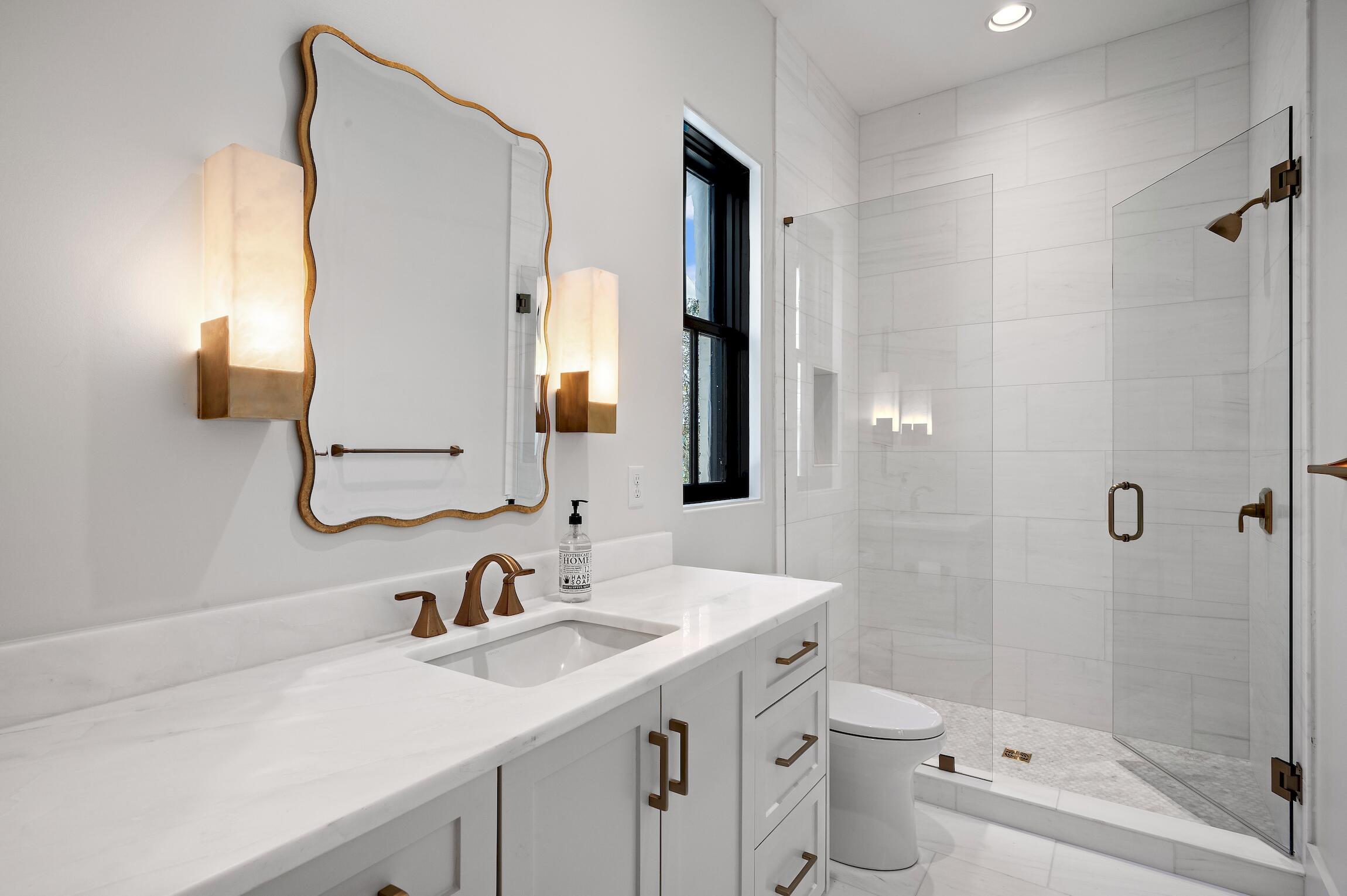 102 Bullard Road Santa Rosa Beach, FL 32459 - Photo 47 of 63 a bathroom with a sink a toilet and shower