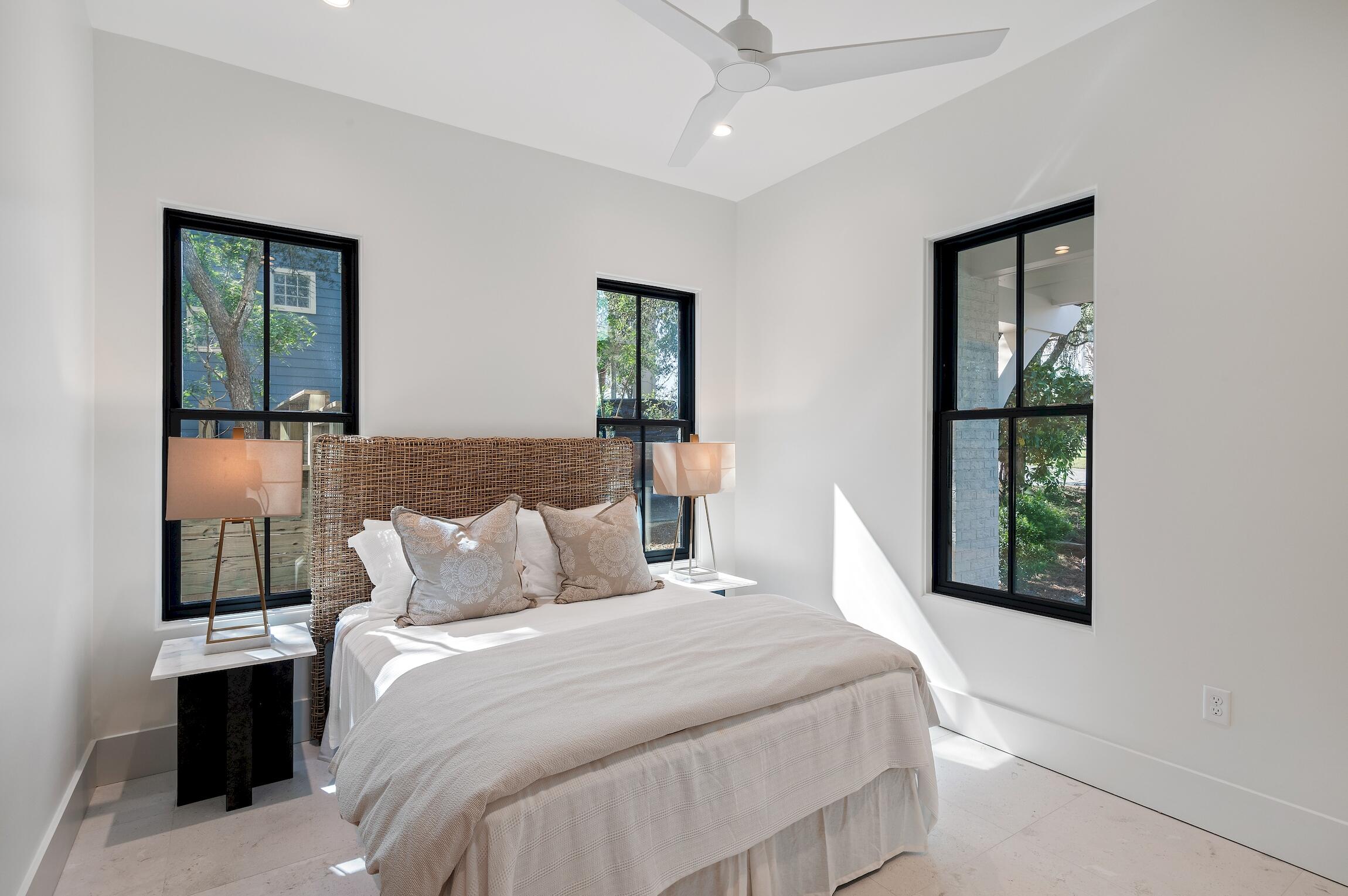 102 Bullard Road Santa Rosa Beach, FL 32459 - Photo 48 of 63 a bedroom with a bed and a window