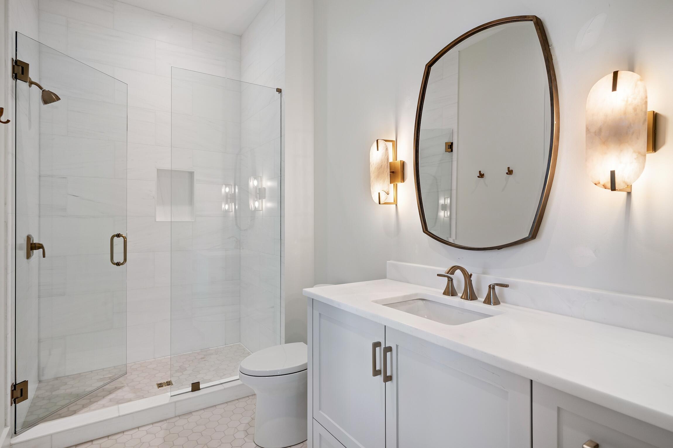102 Bullard Road Santa Rosa Beach, FL 32459 - Photo 49 of 63 a bathroom with a sink a toilet and a mirror