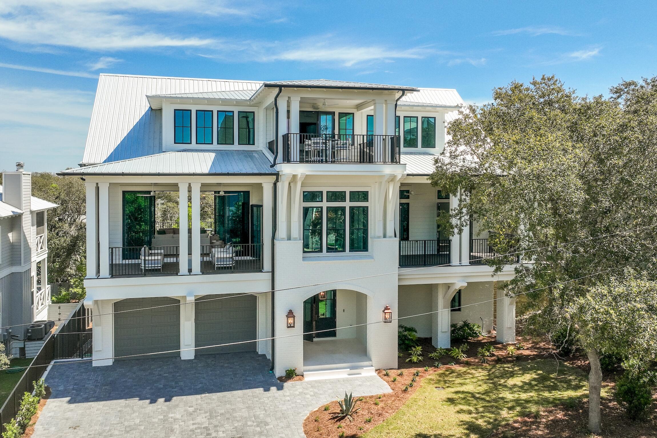 102 Bullard Road Santa Rosa Beach, FL 32459 - Photo 54 of 63 a front view of a house with a yard