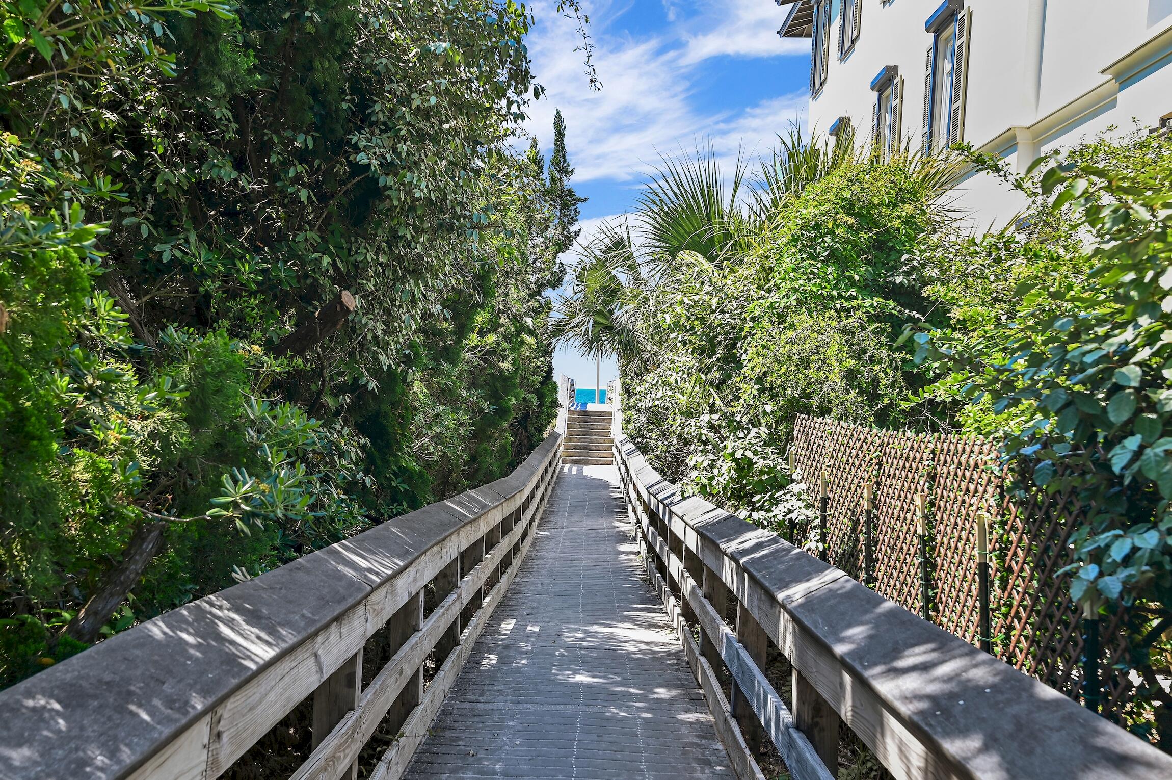 102 Bullard Road Santa Rosa Beach, FL 32459 - Photo 60 of 63 a view of a balcony with wooden floor and fence