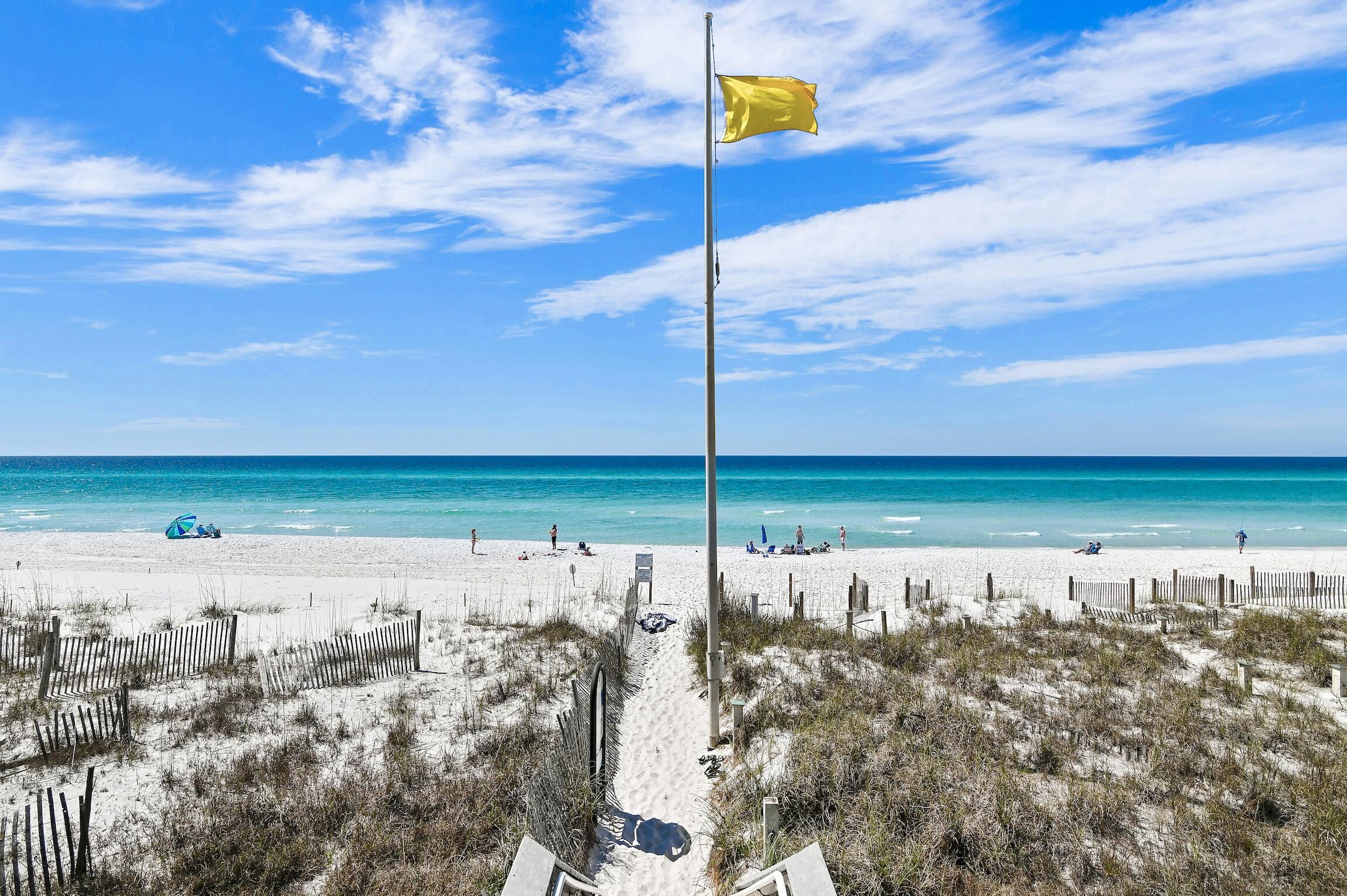 102 Bullard Road Santa Rosa Beach, FL 32459 - Photo 61 of 63 a view of an ocean with a building in the background