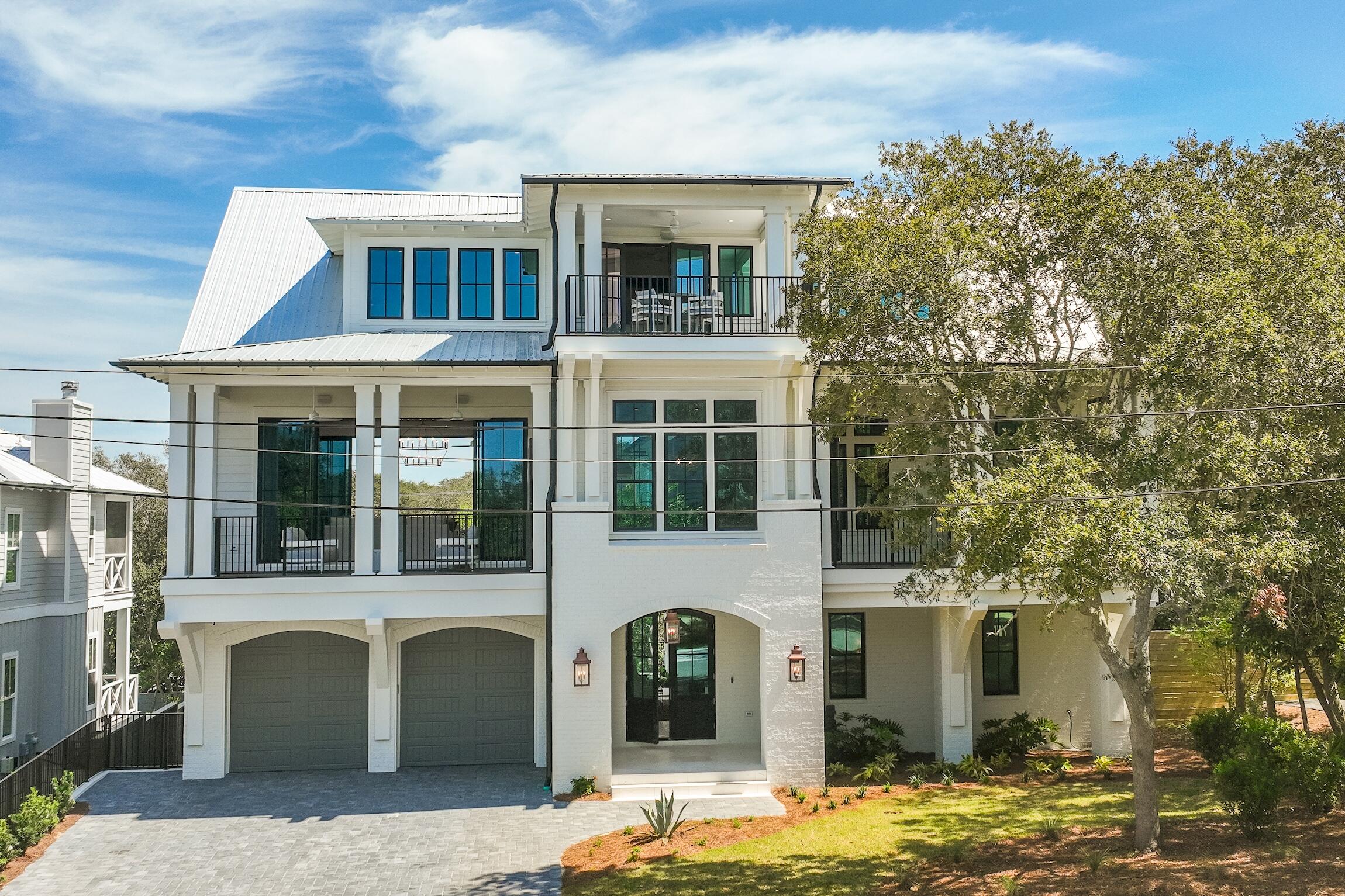 102 Bullard Road Santa Rosa Beach, FL 32459 - Photo 63 of 63 a front view of a house with garden