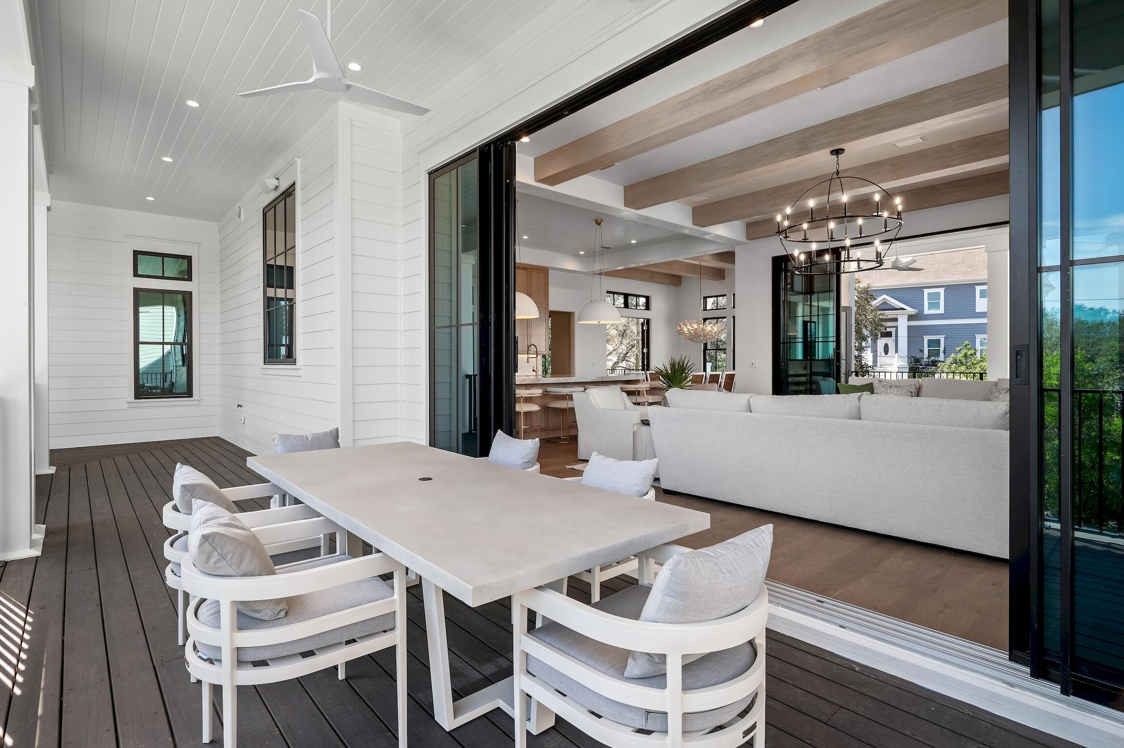 102 Bullard Road Santa Rosa Beach, FL 32459 - Photo 7 of 63 a living room with furniture and a chandelier
