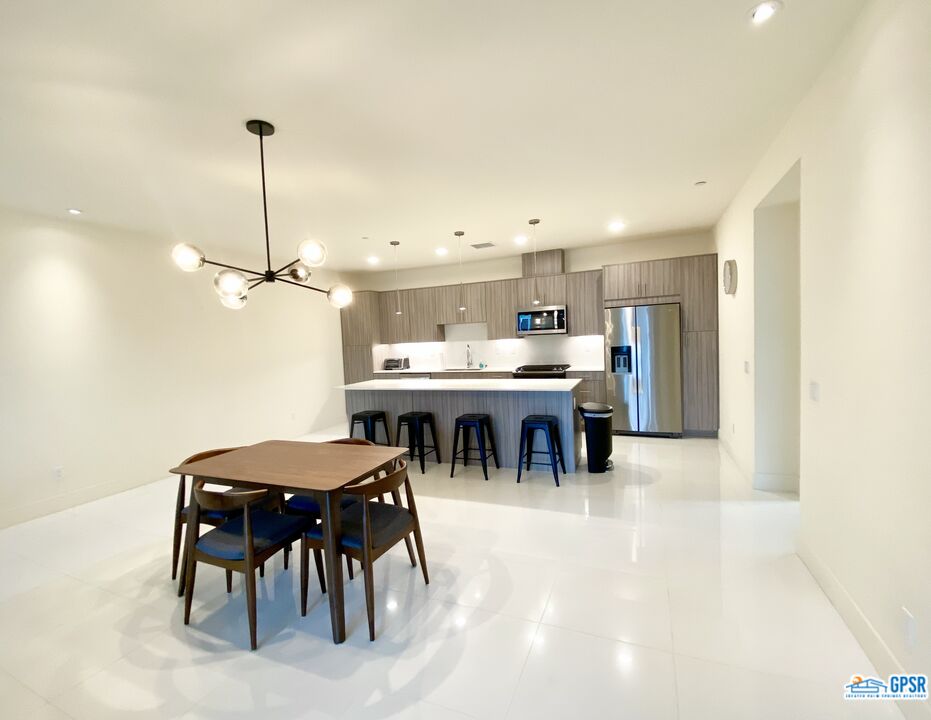 158 The River Palm Springs, CA 92262 - Photo 4 of 17 a view of a dining room with furniture