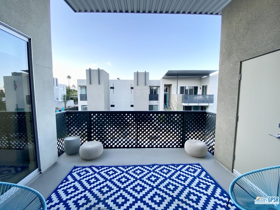 158 The River Palm Springs, CA 92262 - Photo 7 of 17 a bathroom with a sink and a mirror