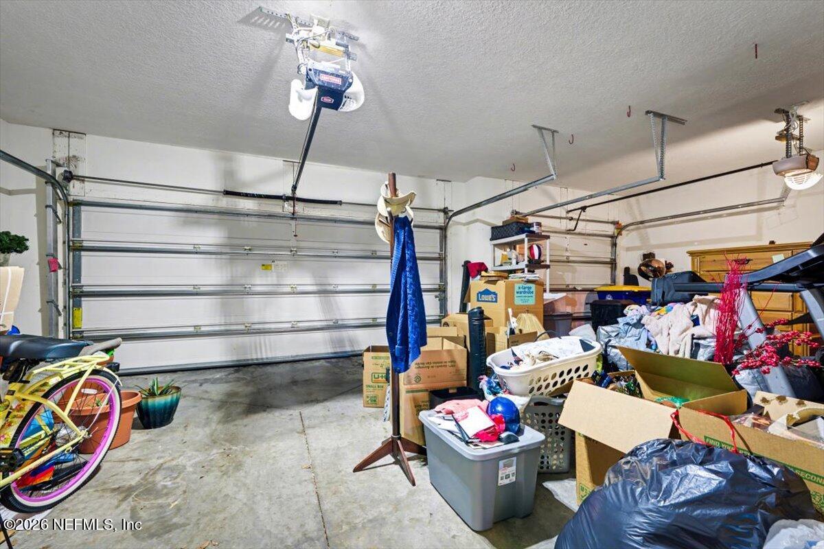 8131 Broward Cove Road Jacksonville, FL 32218 - Photo 20 of 35 a view of a storage room with a lot of stuff