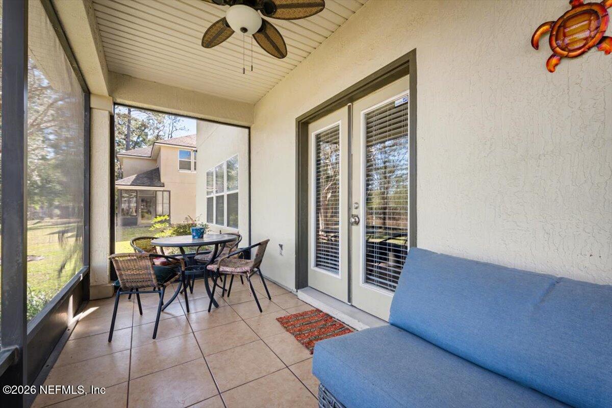 8131 Broward Cove Road Jacksonville, FL 32218 - Photo 30 of 35 a dining room with furniture and large windows