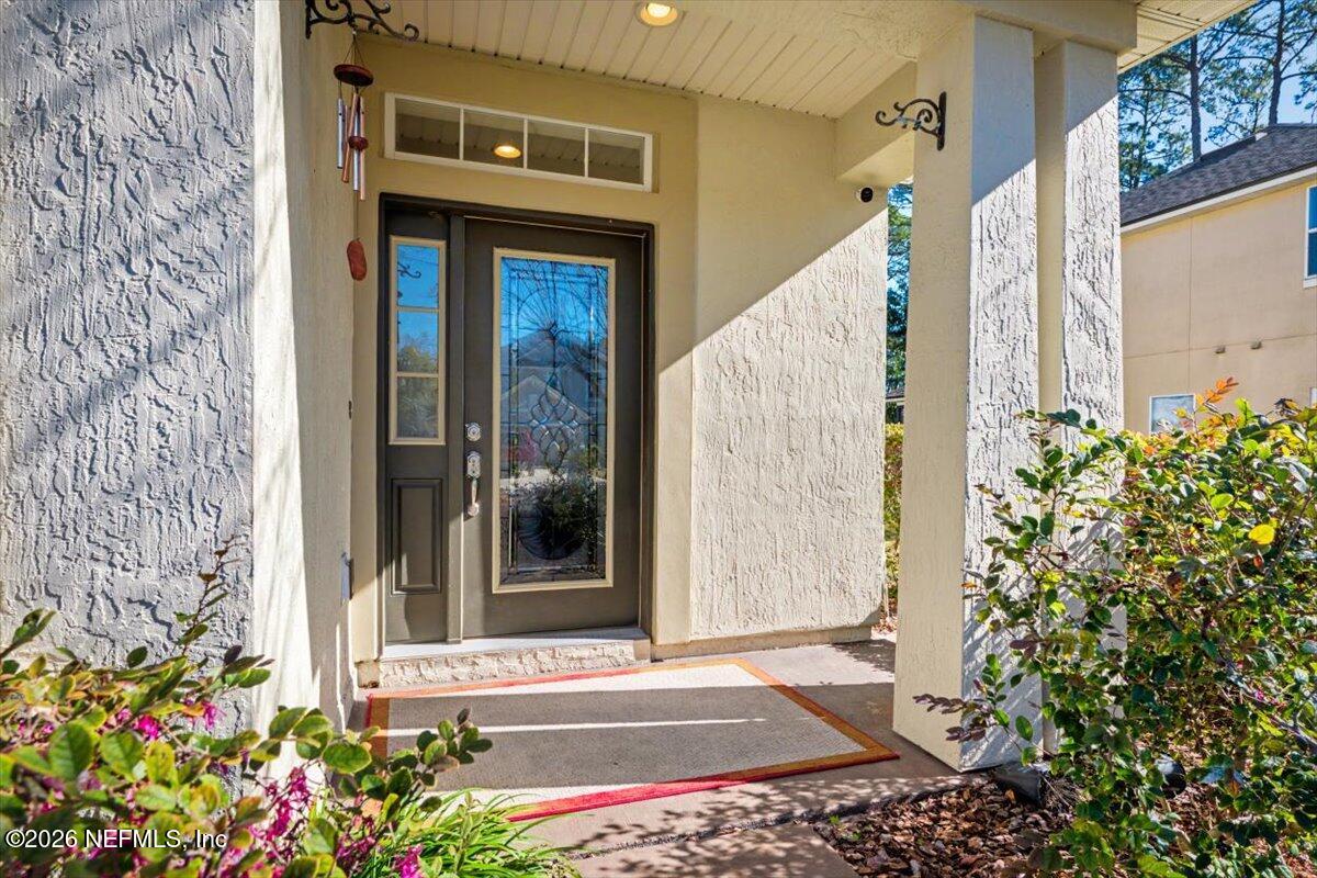 8131 Broward Cove Road Jacksonville, FL 32218 - Photo 7 of 35 a front view of a house with a yard
