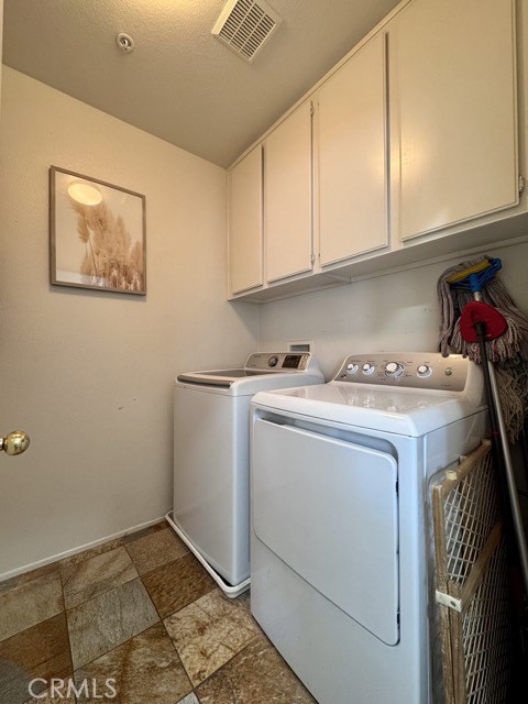 33423 Winston Way, Unit C Temecula, CA 92592 - Photo 23 of 39 a utility room with dryer and washer