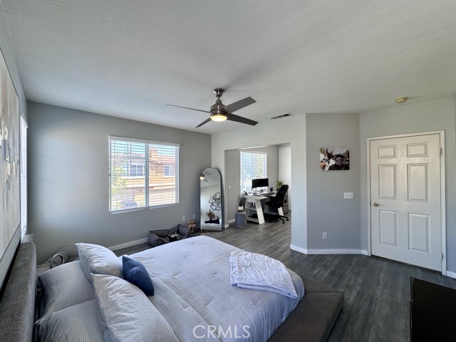33423 Winston Way, Unit C Temecula, CA 92592 - Photo 27 of 39 a bed room with a bed and furniture