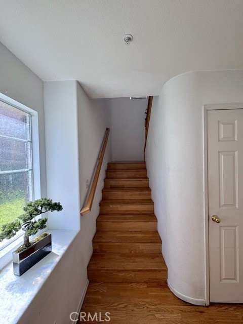33423 Winston Way, Unit C Temecula, CA 92592 - Photo 7 of 39 a view of entryway with wooden floor