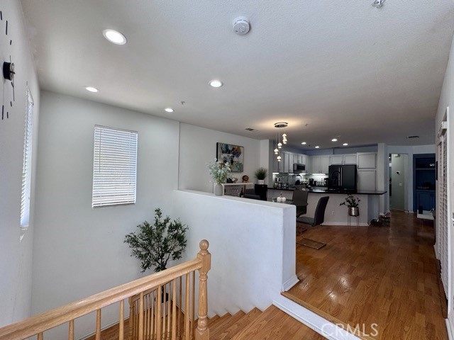 33423 Winston Way, Unit C Temecula, CA 92592 - Photo 9 of 39 a view of kitchen with furniture and wooden floor