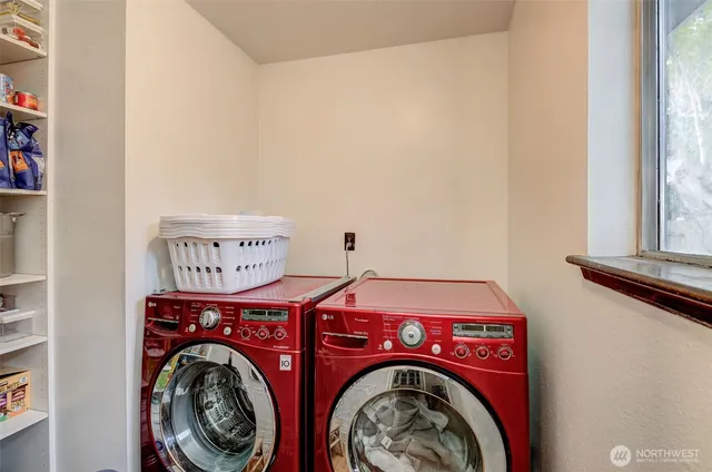 a utility room with dryer and washer
