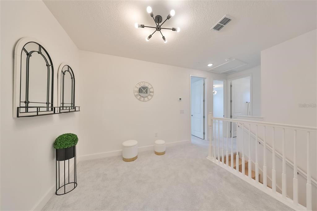933 Signet Drive Apollo Beach, FL 33572 - Photo 26 of 66 a view of an entryway with wooden floor