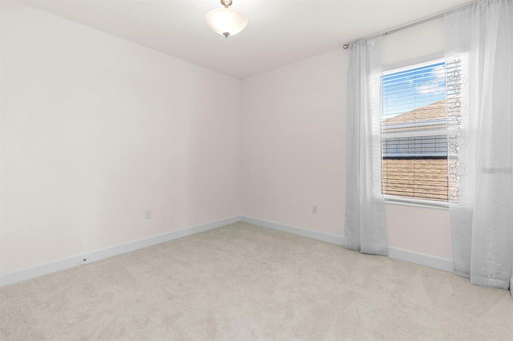 933 Signet Drive Apollo Beach, FL 33572 - Photo 29 of 66 an empty room with a window