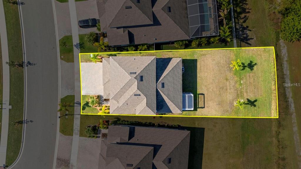 933 Signet Drive Apollo Beach, FL 33572 - Photo 3 of 66 a table with wine bottles and glasses on it