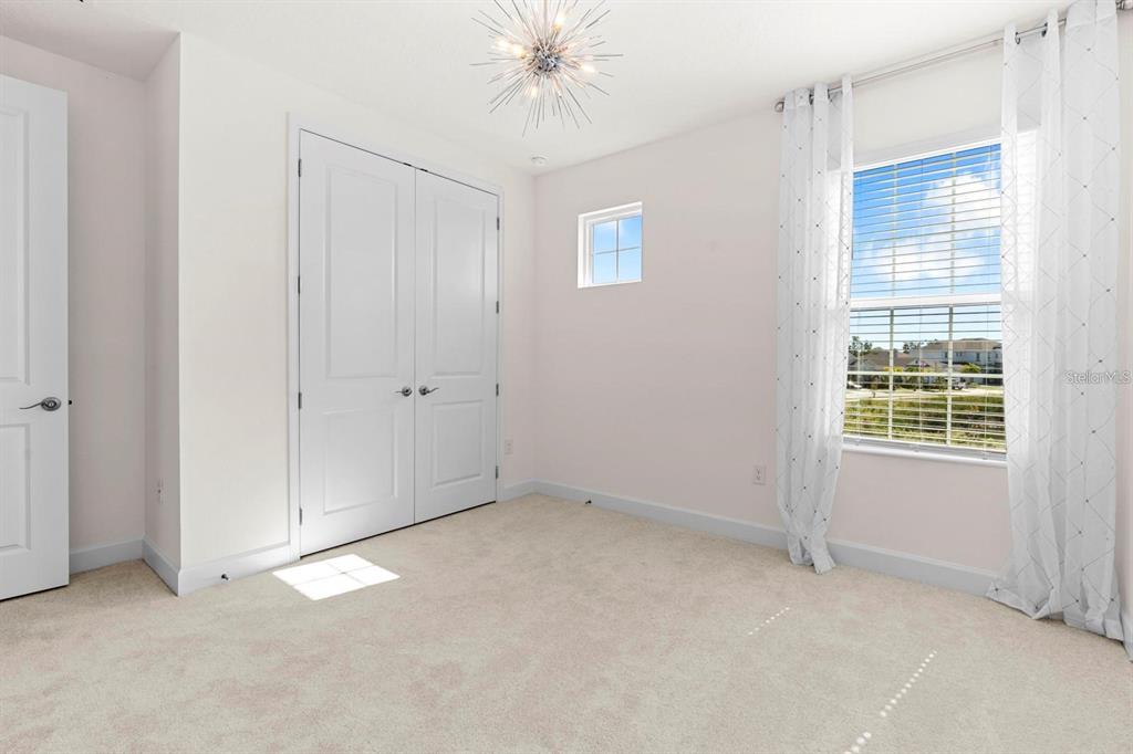 933 Signet Drive Apollo Beach, FL 33572 - Photo 35 of 66 a view of an empty room with a window