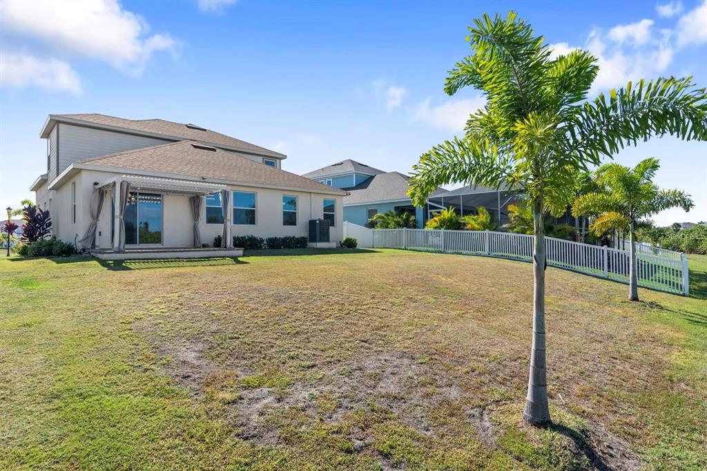 933 Signet Drive Apollo Beach, FL 33572 - Photo 46 of 66 a view of a house with a yard