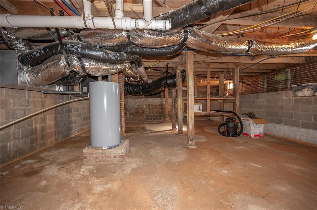 4770 New Walkertown Road Walkertown, NC 27051 - Photo 25 of 27 Unfinished basement space for storage.