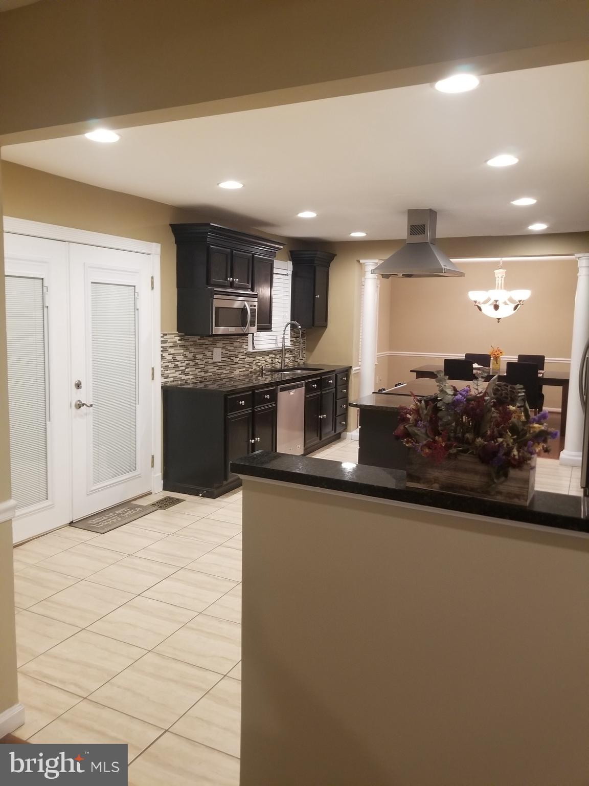 7812 Cliffside Court Springfield, VA 22153 - Photo 12 of 39 family room looking into kitchen
