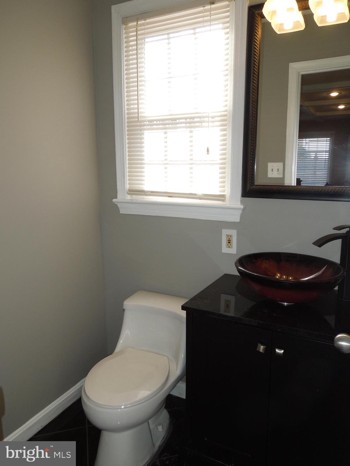7812 Cliffside Court Springfield, VA 22153 - Photo 13 of 39 main level half-bath