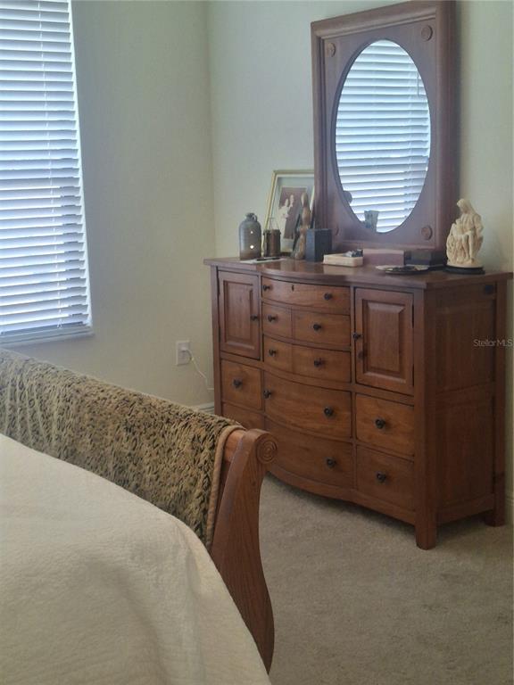 12618 Vander Way New Port Richey, FL 34654 - Photo 6 of 22 a bathroom with a sink and a mirror
