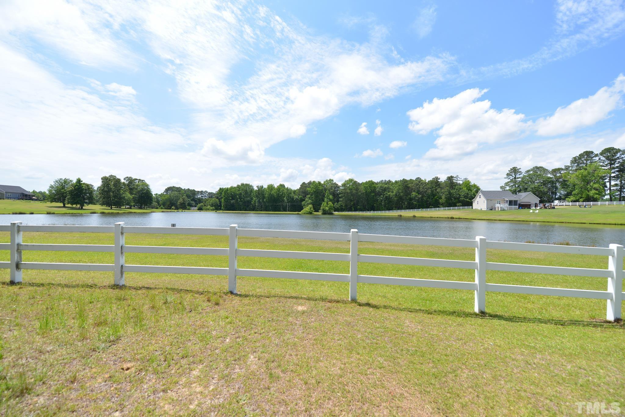 6337 B Zacks Mill Road Angier, NC 27501 - Photo 6 of 7 a view of an outdoor space and tennis court