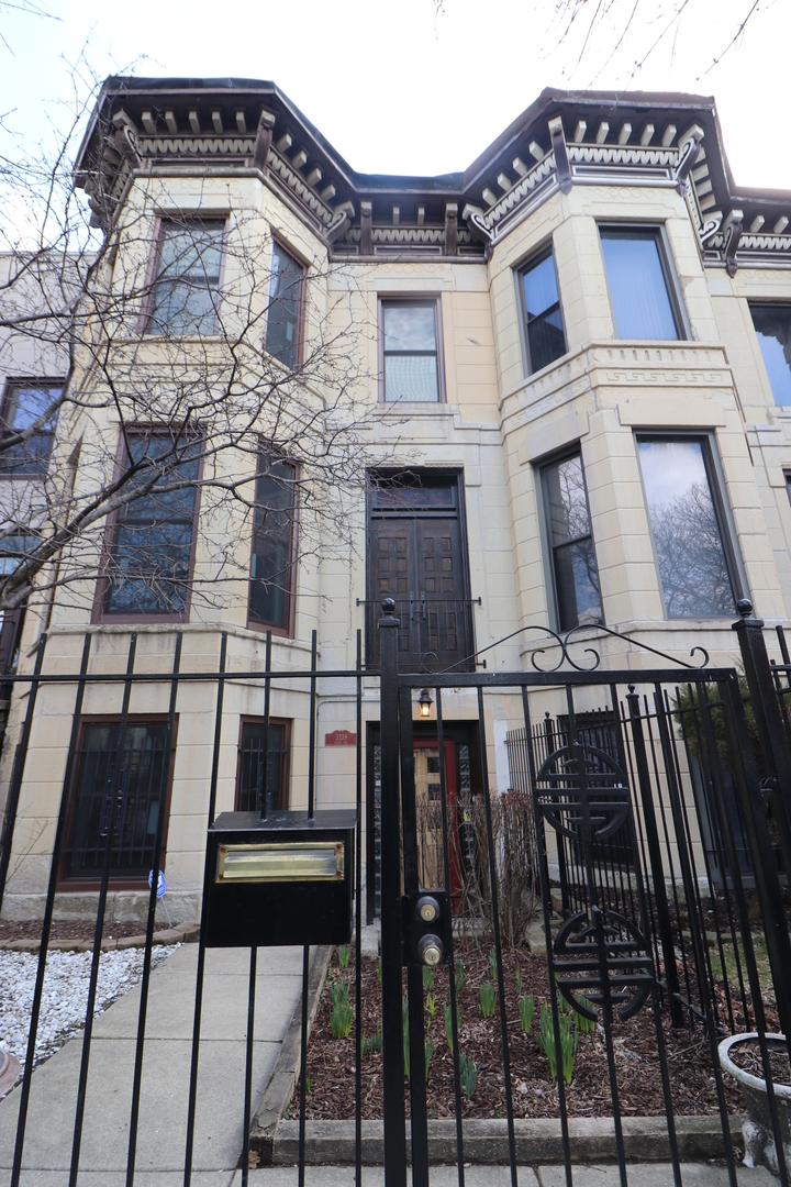 3339 South Giles Avenue Chicago, IL 60616 - Photo 1 of 38 a view of a building with a door