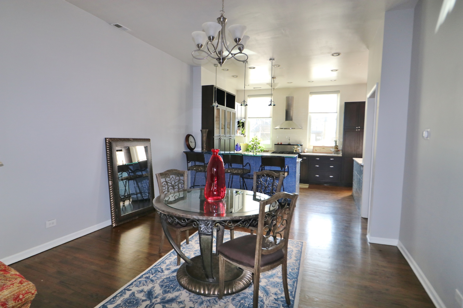 3339 South Giles Avenue Chicago, IL 60616 - Photo 20 of 38 a view of a dining room with furniture window and wooden floor
