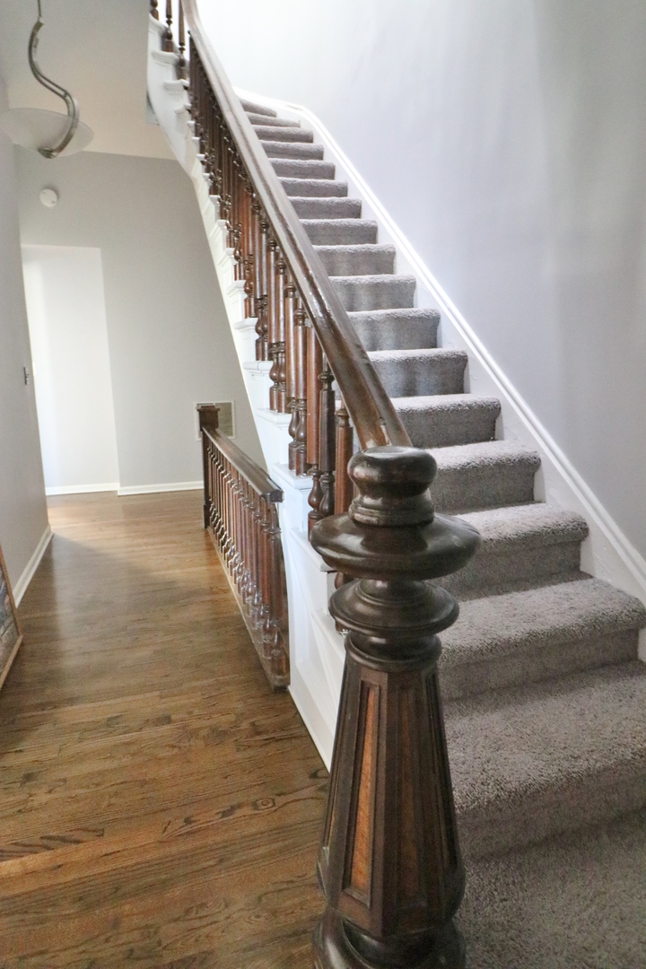 3339 South Giles Avenue Chicago, IL 60616 - Photo 21 of 38 a view of entryway and hall with wooden floor