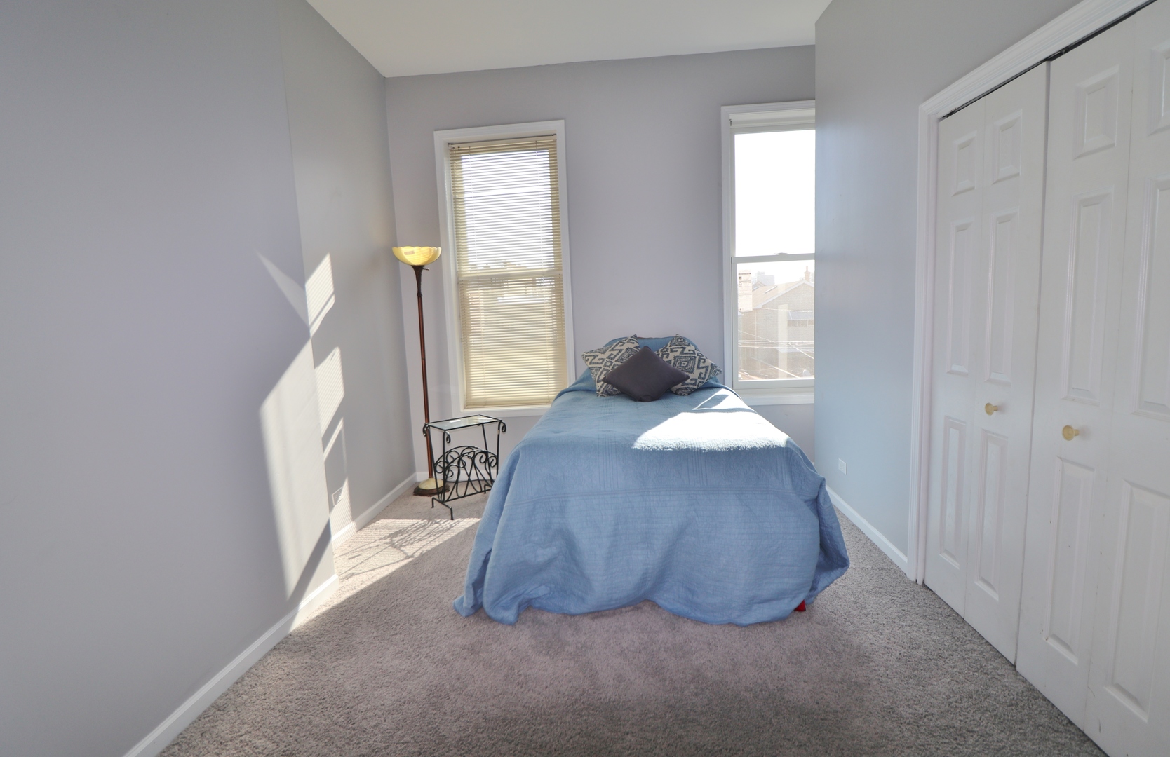 3339 South Giles Avenue Chicago, IL 60616 - Photo 24 of 38 a bedroom with a bed and a window
