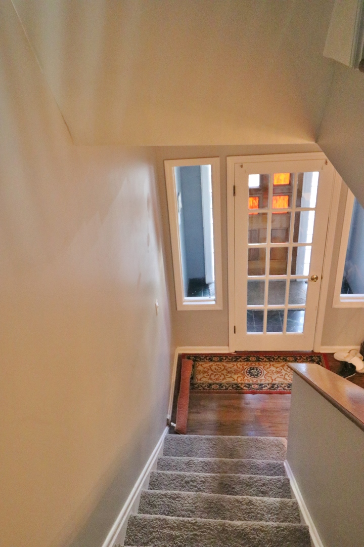 3339 South Giles Avenue Chicago, IL 60616 - Photo 4 of 38 a view of a room with window and stairs