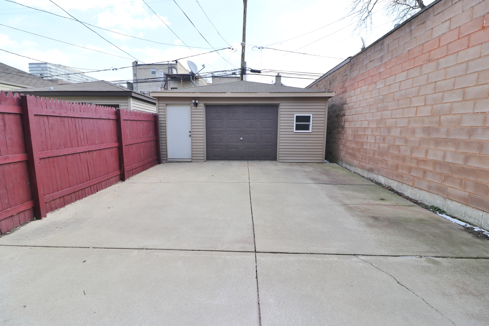 3339 South Giles Avenue Chicago, IL 60616 - Photo 33 of 38 a front view of a house with a garage
