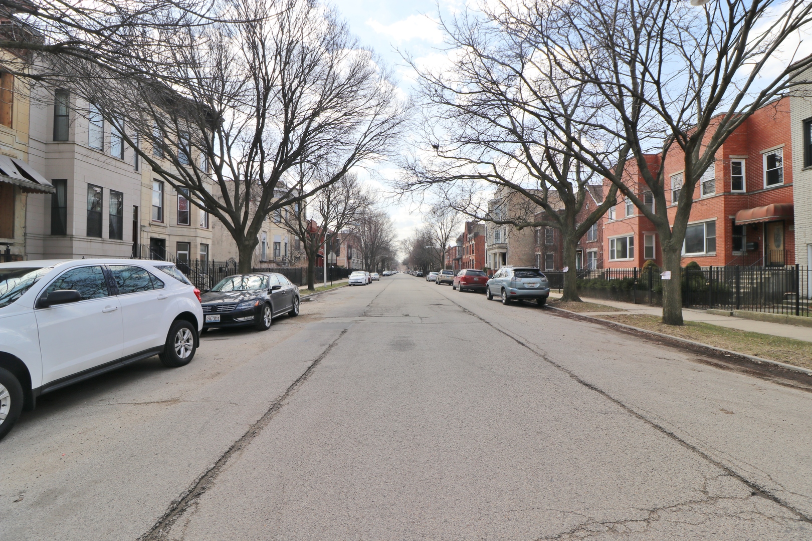 3339 South Giles Avenue Chicago, IL 60616 - Photo 38 of 38 a city street lined with buildings and cars