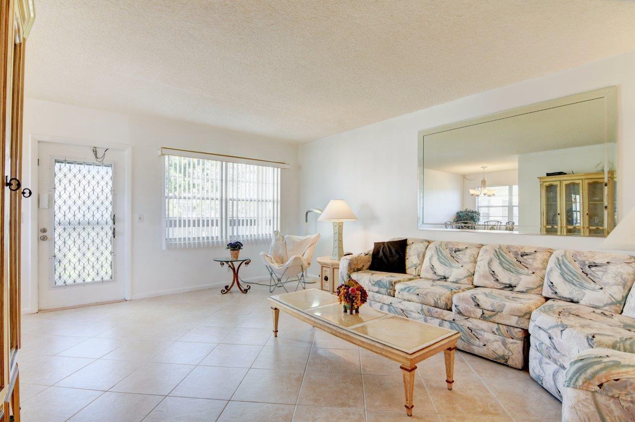 103 Suffolk C, Unit 103C Boca Raton, FL 33434 - Photo 2 of 17 living room 1