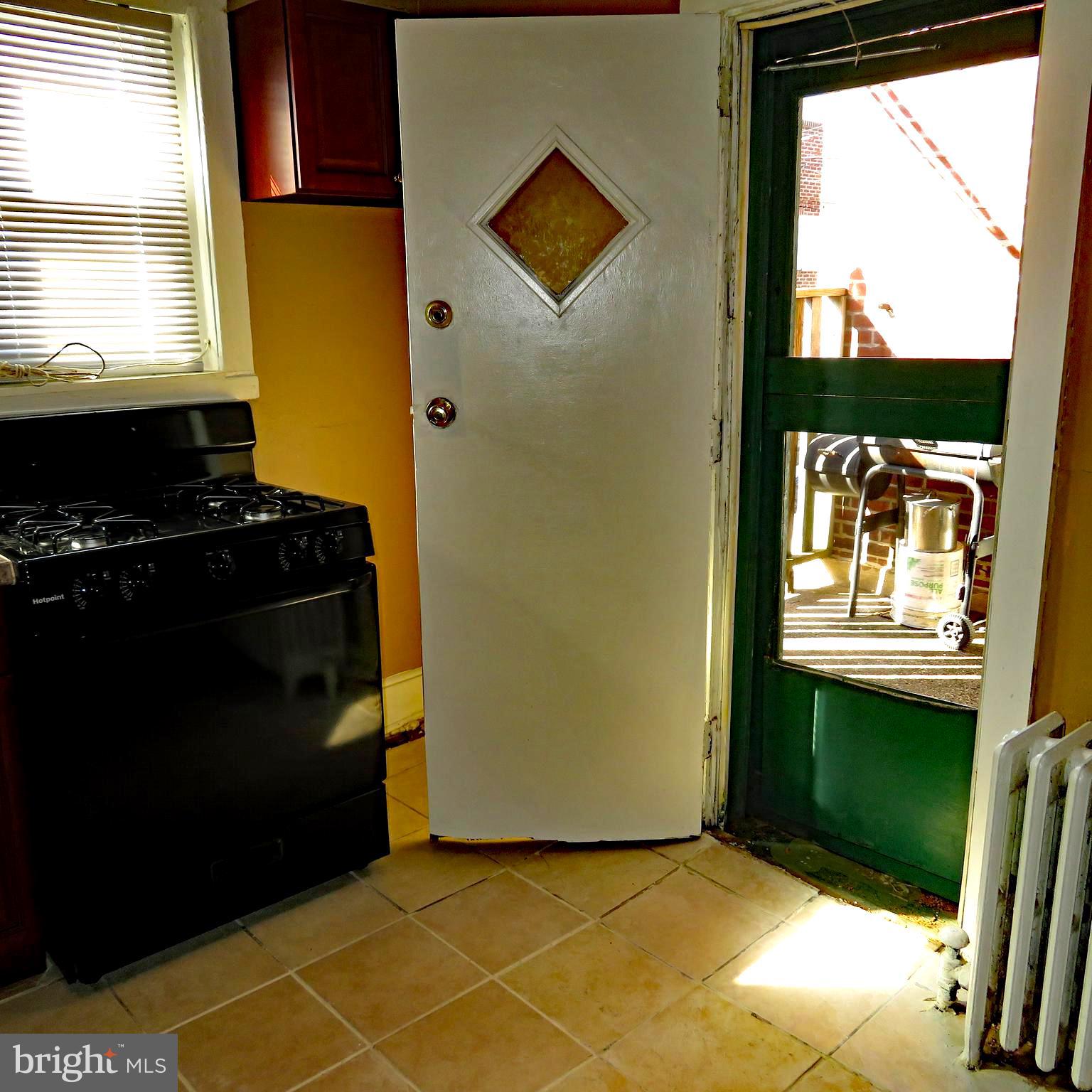 7710 Temple Road Philadelphia, PA 19150 - Photo 4 of 18 KITCHEN TO THE BACK DECK