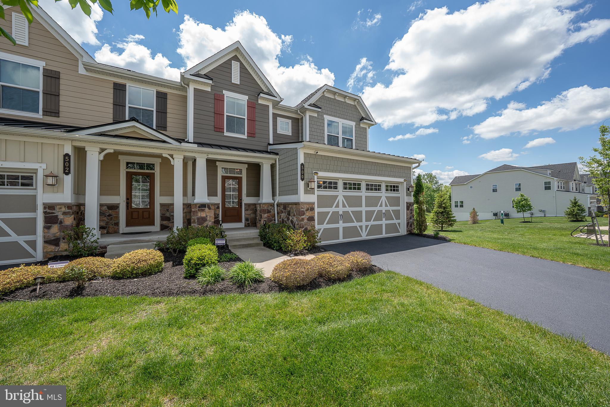 500 Quarry Point Road Malvern, PA 19355 - Photo 1 of 45 a front view of a house with a garden