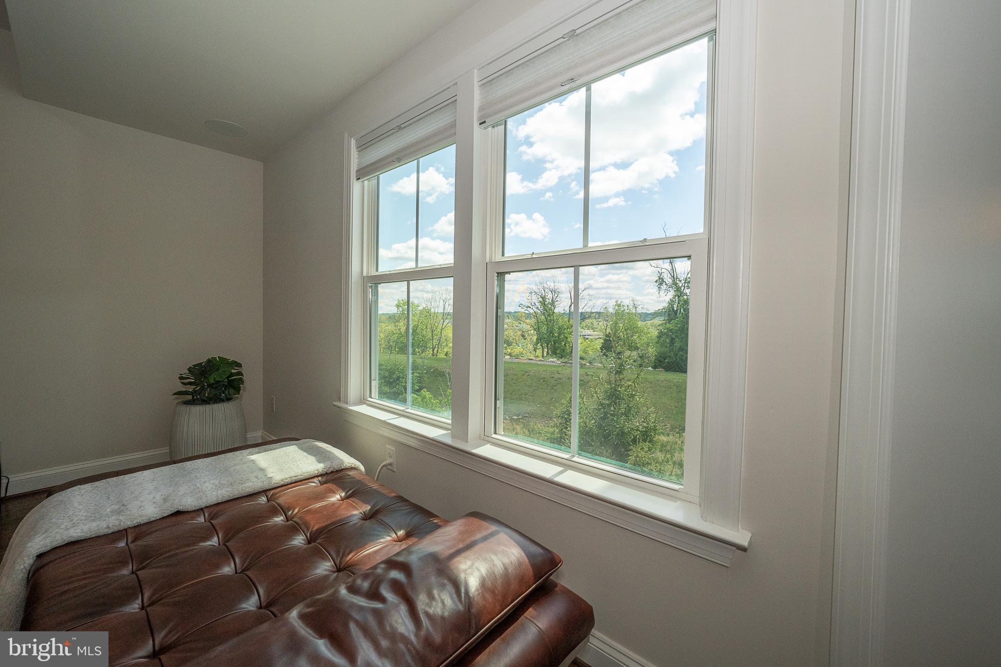 500 Quarry Point Road Malvern, PA 19355 - Photo 13 of 45 a bedroom with a bed and a window