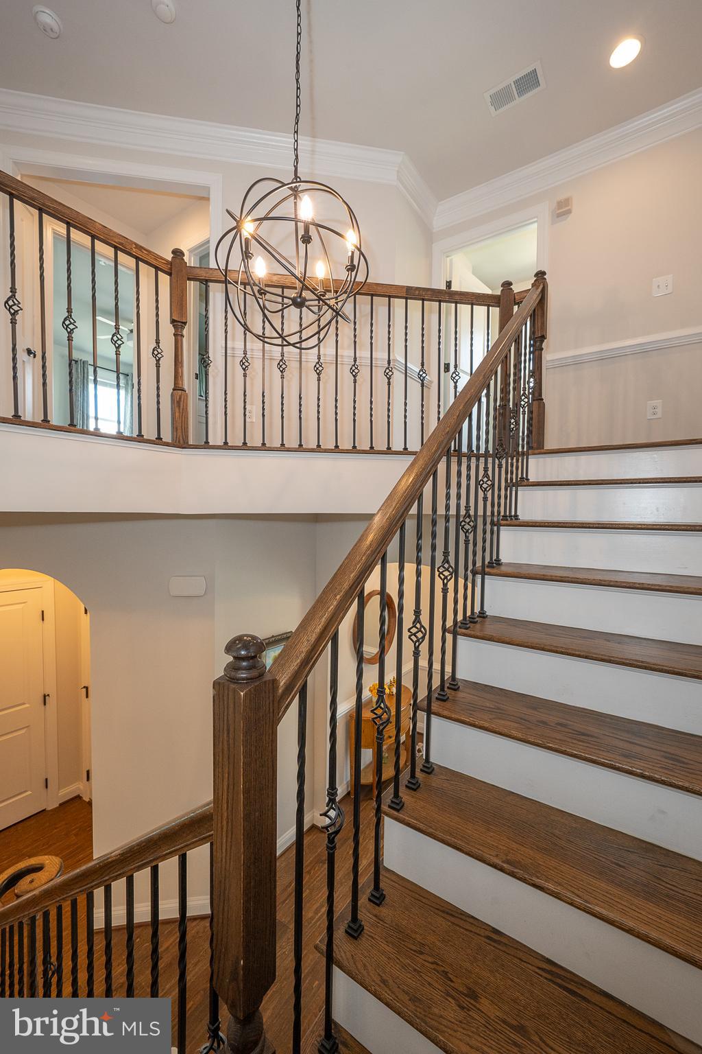 500 Quarry Point Road Malvern, PA 19355 - Photo 22 of 45 a view of staircase with railing and a chandelier