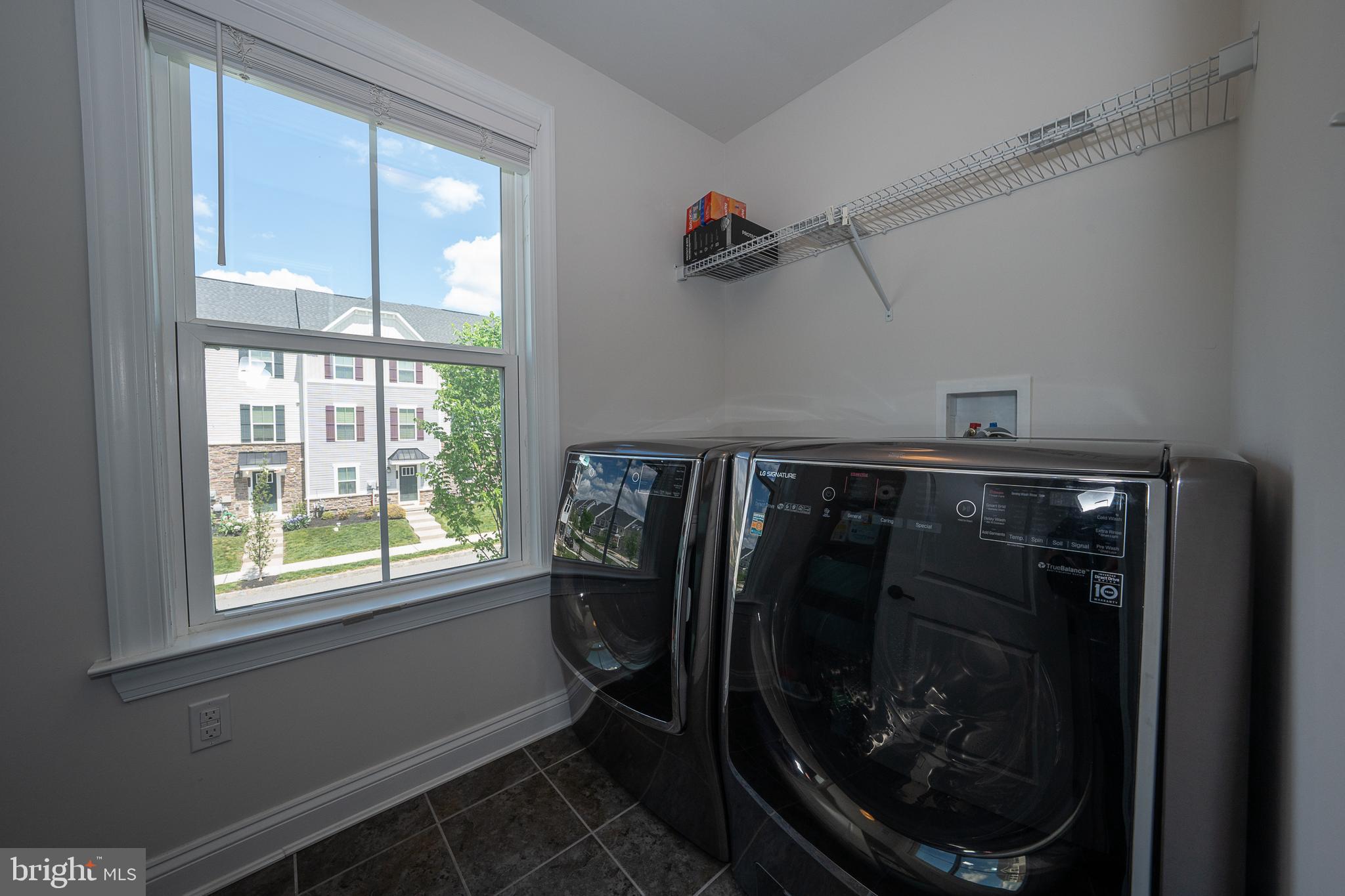 500 Quarry Point Road Malvern, PA 19355 - Photo 24 of 45 a close up of a washer and dryer