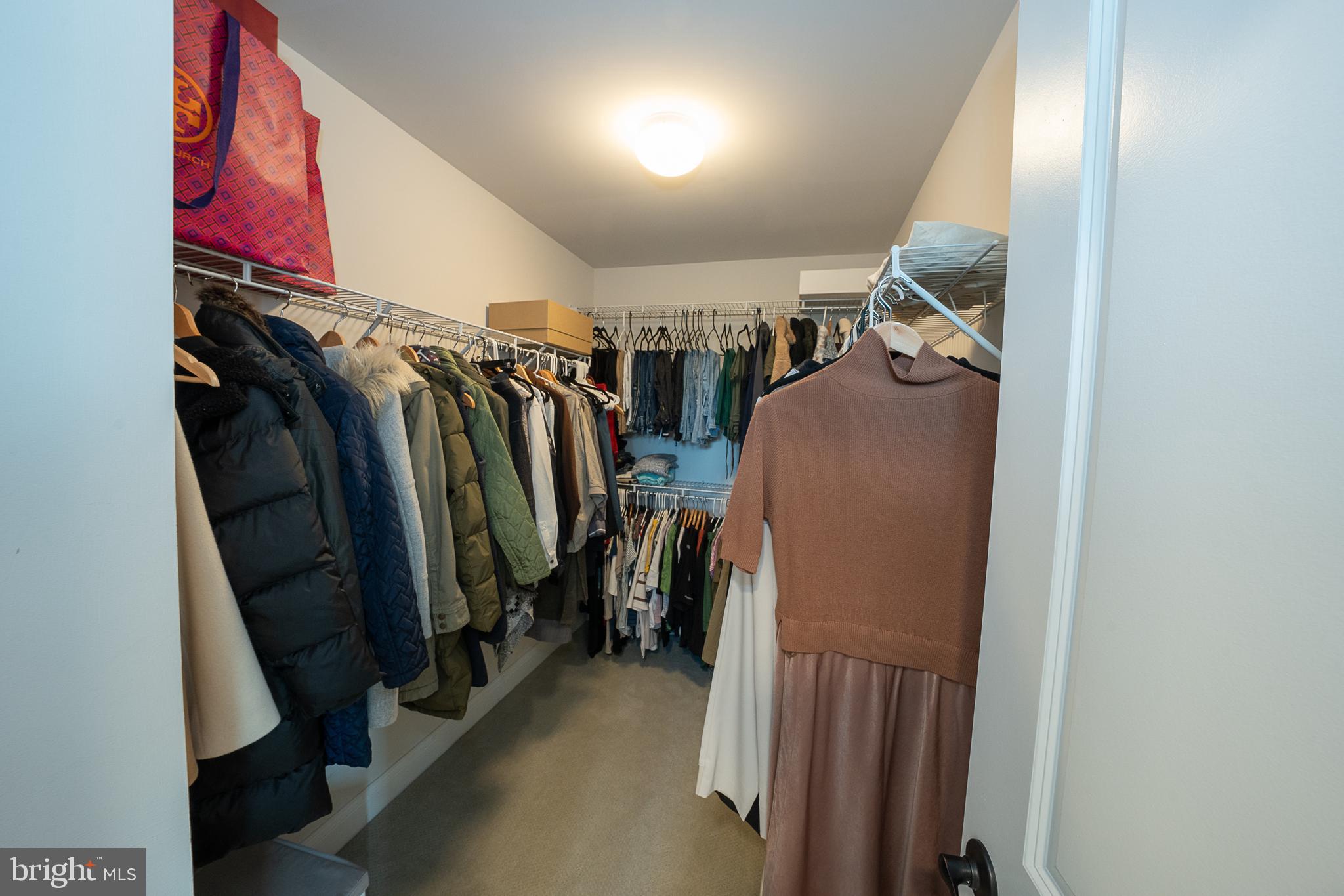 500 Quarry Point Road Malvern, PA 19355 - Photo 36 of 45 a view of walk in closet with clothes and shoes