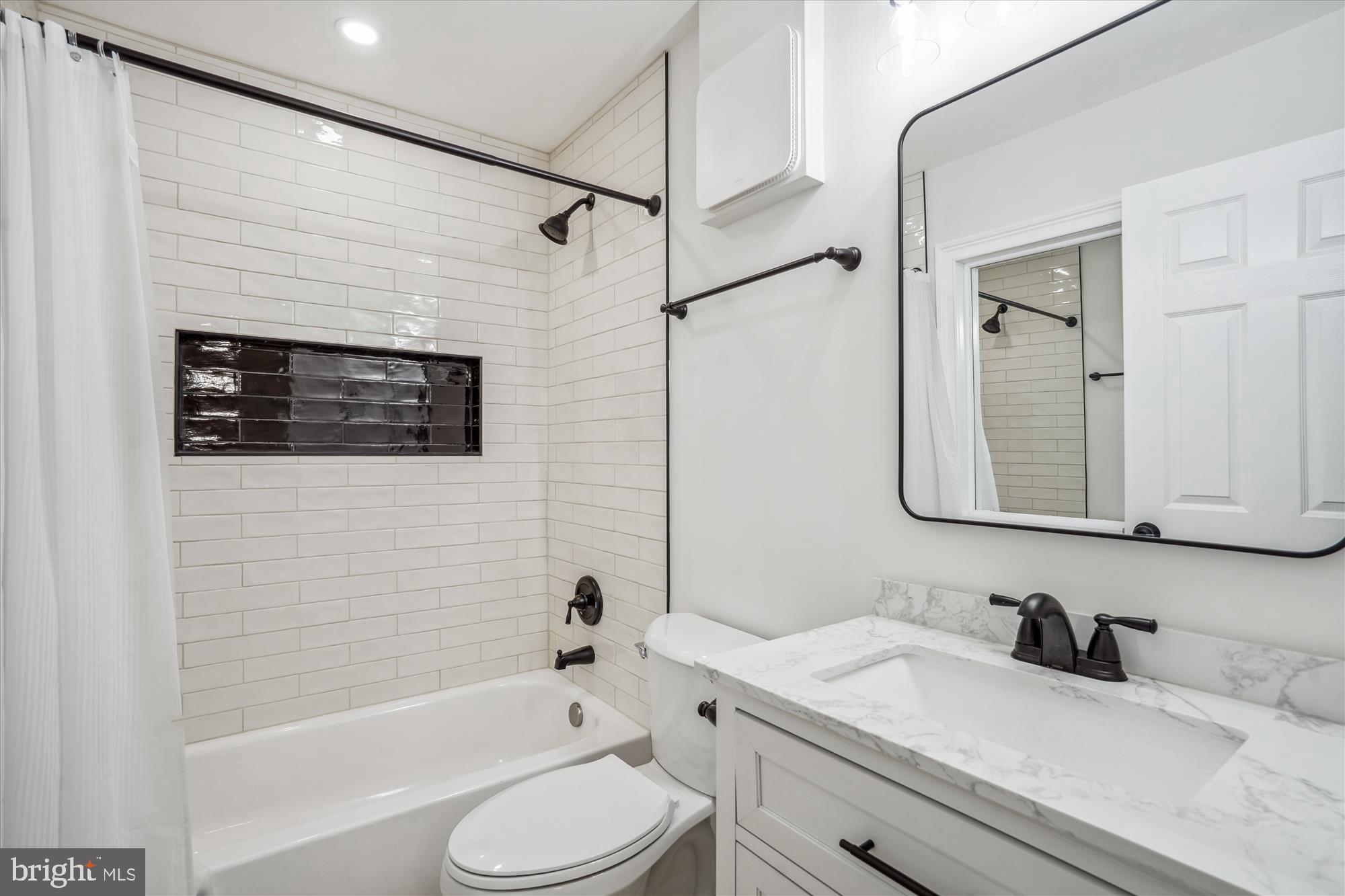 8156 Carrleigh Parkway Springfield, VA 22152 - Photo 22 of 39 Beautiful remodeled top to bottom full hall bath