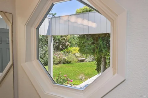 a spacious bathroom with a double vanity sink mirror and double