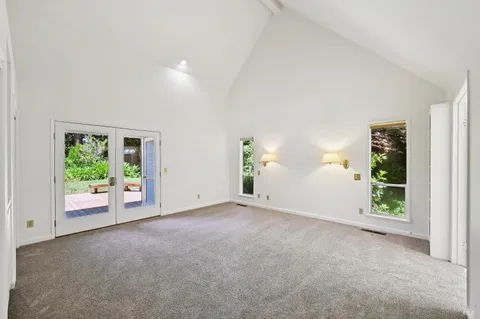 a bathroom with a shower toilet and sink